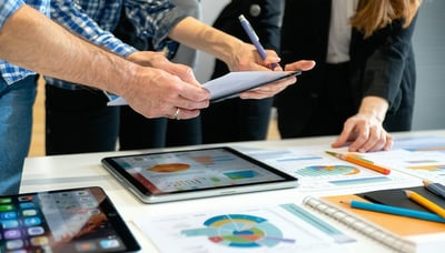 Newsletter signup illustration showing professionals engaging with technology and learning materials